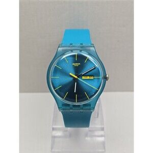 Swatch Turquoise Rebel SUOL700 Blue Day Date Swiss Quartz Watch New Battery 41MM